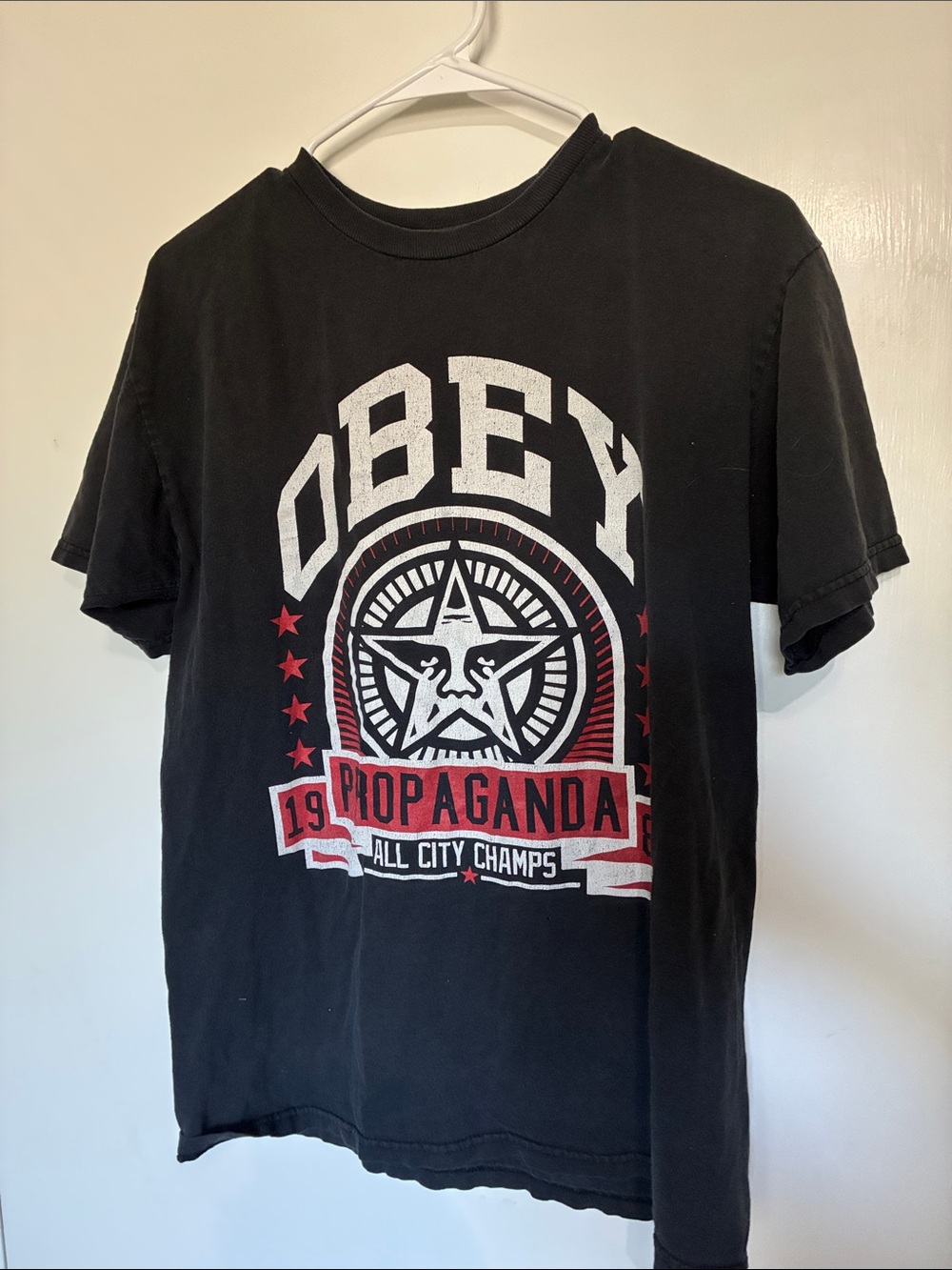 Obey Black Graphic Tee with White and Red Propaganda Crest